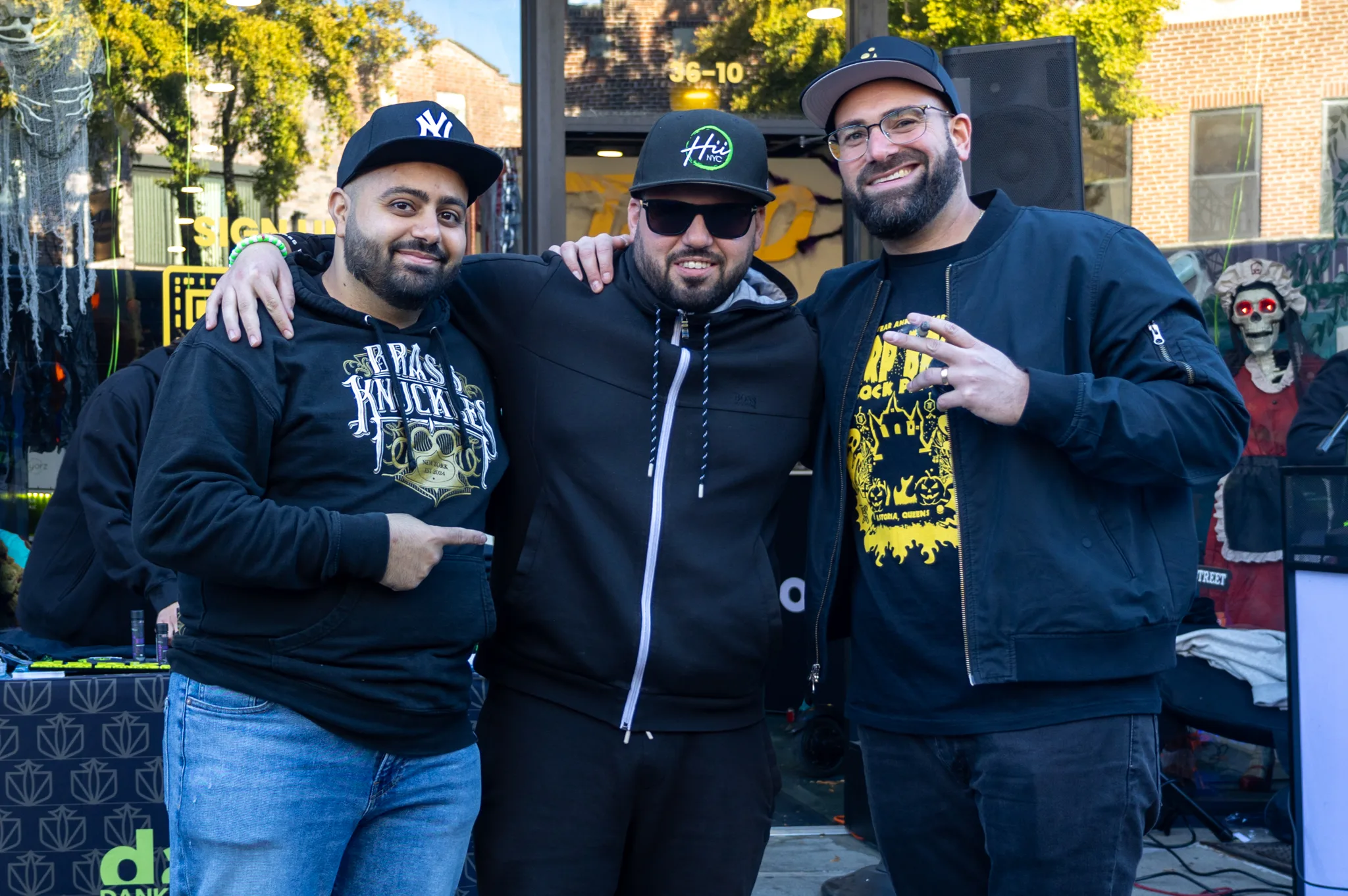Gold Standard Solutions with clients Hii NYC and Brass Knuckles outside Dank dispensary